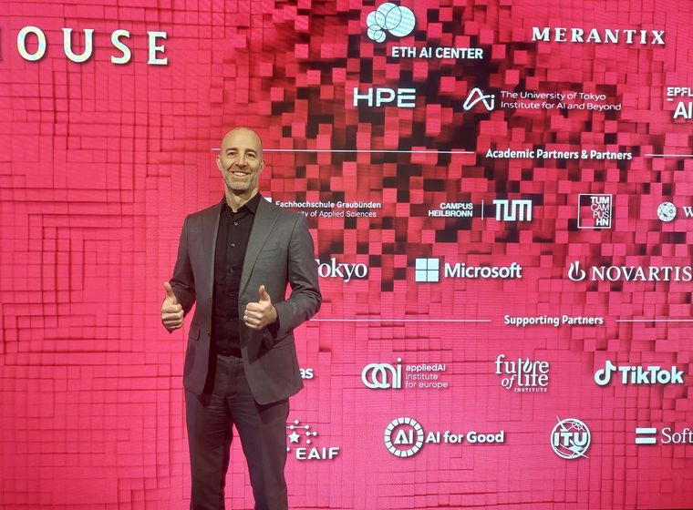 Robert MacKenzie speaking at AI House, Davos