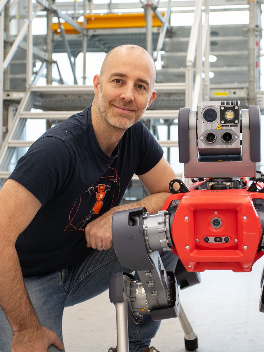 Robert MacKenzie with a quadruped inspection robot
